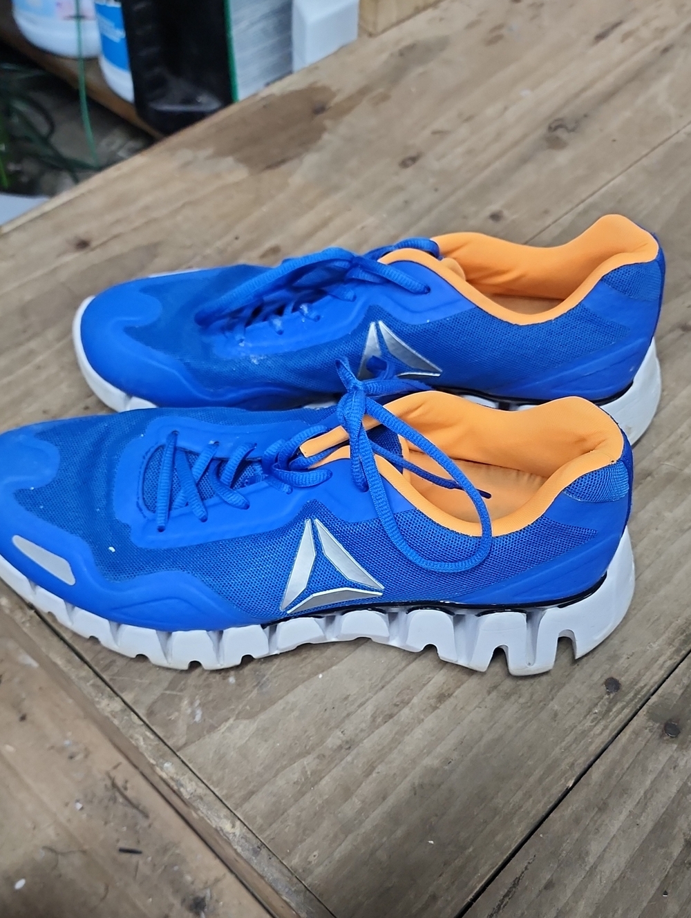 Reebok Mens Blue Athletic Sneakers with Orange Interior